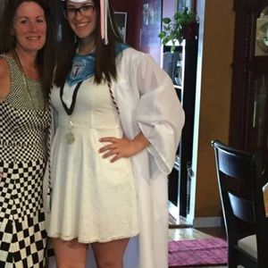 White dress with pockets. Spaghetti straps.